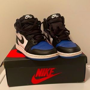 Black and blue air jordan 1s